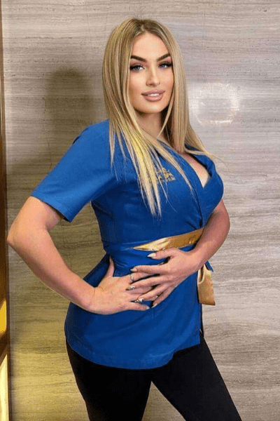 A russian massager girl in blue dress