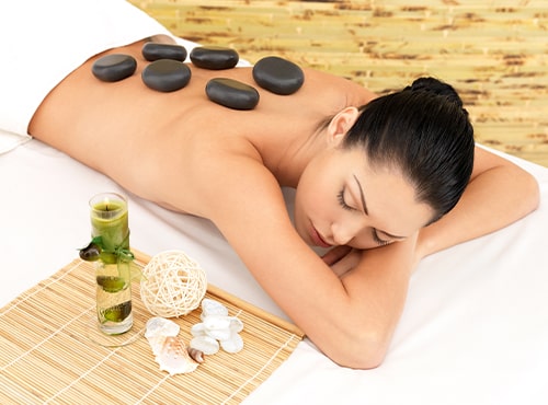 women having hot stone massage in delhi